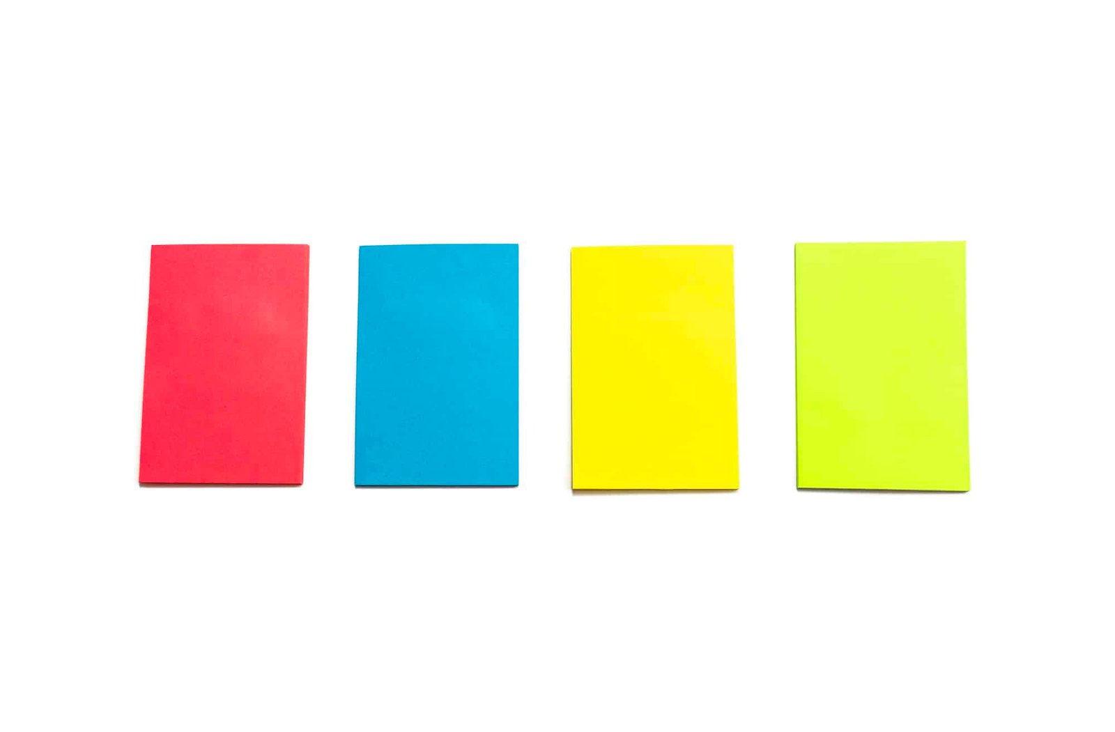 Collection of different colored sheets of note papers Isolated on white background. Copy space